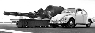 The General Electric GAU-8 Gatling gun, with a VW Beetle for scale. (US Air Force)